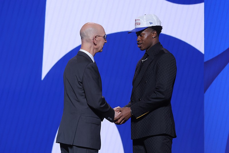 Jun 25, 2025; Brooklyn, NY, USA; VJ Edgecombe stands with NBA commissioner Adam Silver after being selected as the third pick by the Philadelphia 76ers in the first round of the 2025 NBA Draft at Barclays Center. Mandatory Credit: Brad Penner-Imagn Images