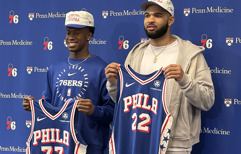 VJ Edgecombe (77) and Johni Broome (22) pose for pictures at their introductory press conference with the Sixers.