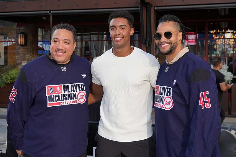 Jun 26, 2025; Los Angeles, California, USA; Anthony Stewart (left), Flyers' second round pick Carter Amico (center) and Mark Fraser pose at the NHL STREET and NHL Player Inclusion Coalition Panel Discussion at LA Live. Mandatory Credit: Kirby Lee-Imagn Images