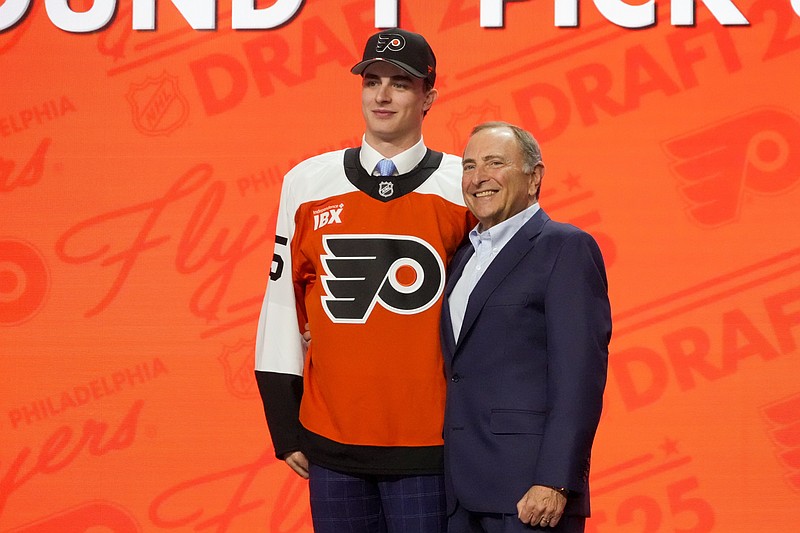 Jun 27, 2025; Los Angeles, California, USA; Porter Martone is selected as the sixth overall pick to the Philadelphia Flyers in the first round of the 2025 NHL Draft at Peacock Theater. Mandatory Credit: Kirby Lee-Imagn Images