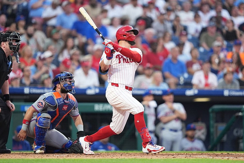 Jun 22, 2025; Philadelphia, Pennsylvania, USA; Philadelphia Phillies designated hitter Kyle Schwarber (12) hits a home run against the New York Mets in the fourth inning at Citizens Bank Park. Mandatory Credit: Kyle Ross-Imagn Images