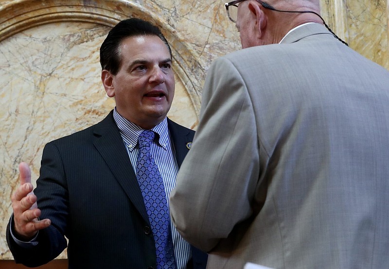 Sen. Nicholas Scutari talks with Sen. Bob Smith in the Statehouse in Trenton on Monday, June 30, 2025. (Dana DiFilippo | New Jersey Monitor)