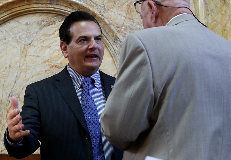 Sen. Nicholas Scutari talks with Sen. Bob Smith in the Statehouse in Trenton on Monday, June 30, 2025. (Dana DiFilippo | New Jersey Monitor)