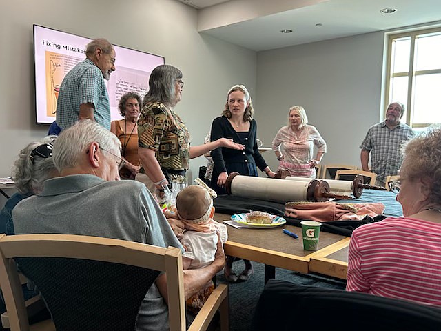 PROVIDED/In June, Rabbi Stephanie Breitsman shared her inspiring journey of becoming a soferet, a Hebrew scribe. More than 25 Village members and guests enjoyed a program where Rabbi Stephanie took attendees behind the scenes of the sacred practice of sofrut, the ancient art of hand-copying Torah scrolls.