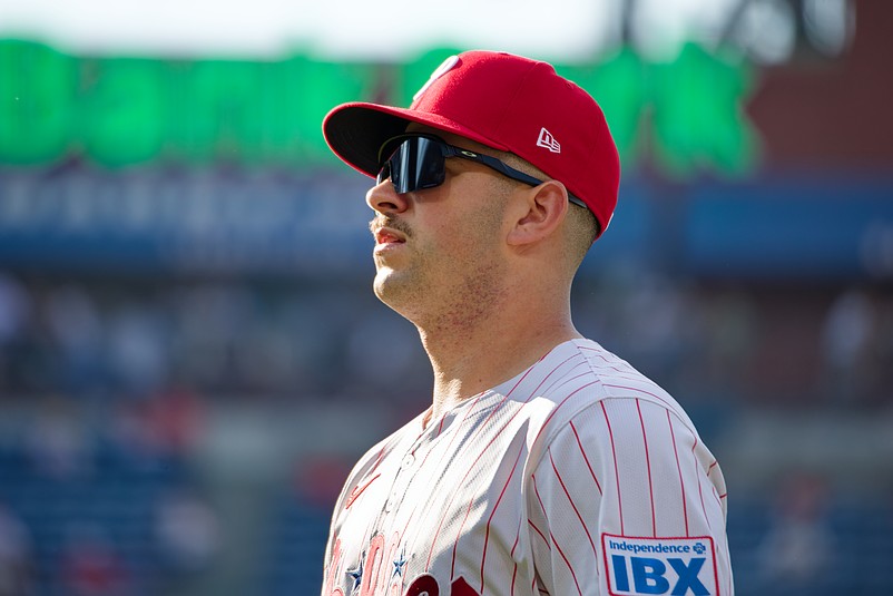 Jul 2, 2025; Philadelphia, Pennsylvania, USA; Philadelphia Phillies infielder Otto Kemp (4) warms up before a game against the San Diego Padres at Citizens Bank Park. (Credit: Grace Del Pizzo-On Pattison)