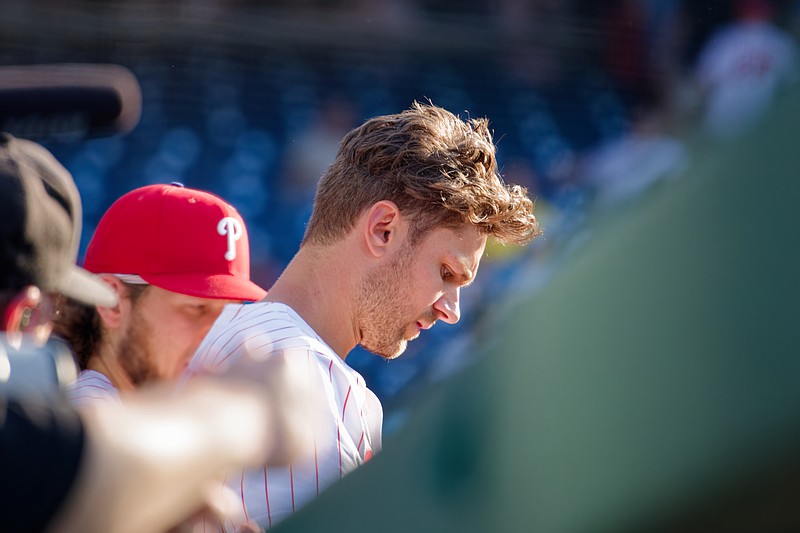 Jul 2, 2025; Philadelphia, Pennsylvania, USA; Philadelphia Phillies shortstop Trea Turner (7) looks on from the dugout against the San Diego Padres at Citizens Bank Park. (Credit: Grace Del Pizzo-On Pattison)
