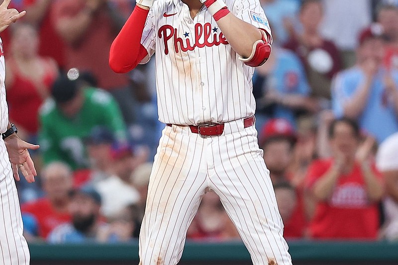 Jul 2, 2025; Philadelphia, Pennsylvania, USA; Philadelphia Phillies third base Alec Bohm (28) reacts to his RBI triple against the San Diego Padres during the seventh inning at Citizens Bank Park. Mandatory Credit: Bill Streicher-Imagn Images