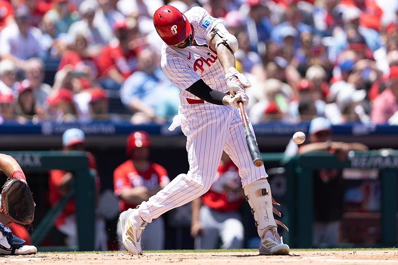 Jul 4, 2025; Philadelphia, Pennsylvania, USA; Philadelphia Phillies outfielder Nick Castellanos (8) hits a two RBI home run during the first inning against the Cincinnati Reds at Citizens Bank Park. Mandatory Credit: Bill Streicher-Imagn Images