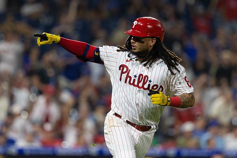 Sep 15, 2021; Philadelphia, Pennsylvania, USA; Philadelphia Phillies shortstop Freddy Galvis (8) reacts to his two run home run against the Chicago Cubs during the fourth inning at Citizens Bank Park. Mandatory Credit: Bill Streicher-USA TODAY Sports
