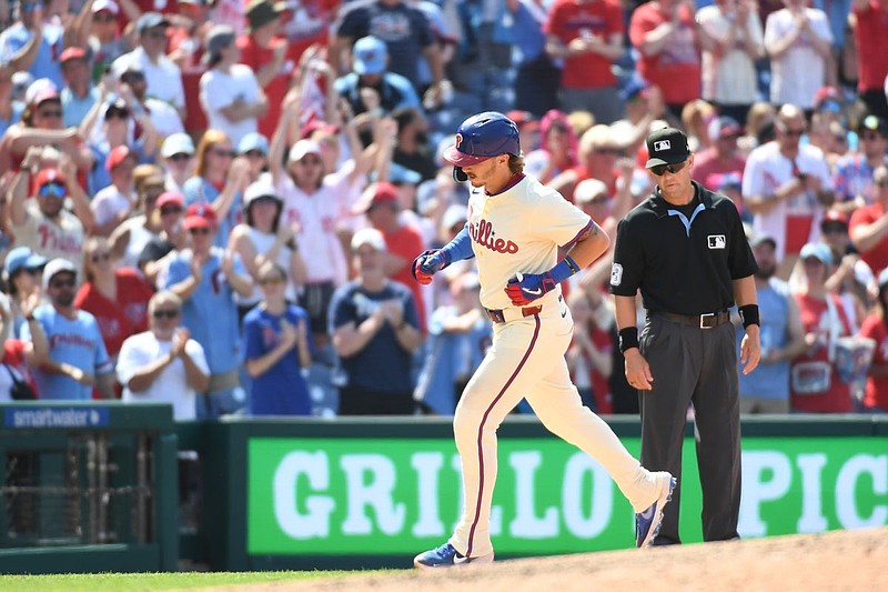 Jul 6, 2025; Philadelphia, Pennsylvania, USA; Philadelphia Phillies second base Bryson Stott (5) runs the bases after hitting a home run during the eighth inning against the Cincinnati Reds at Citizens Bank Park. Mandatory Credit: Eric Hartline-Imagn Images