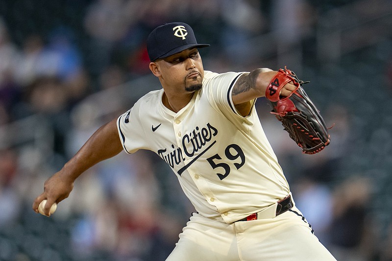 May 7, 2025; Minneapolis, Minnesota, USA; Minnesota Twins relief pitcher Jhoan Duran (59) delivers a pitch against the Baltimore Orioles in the ninth inning at Target Field. Mandatory Credit: Jesse Johnson-Imagn Images