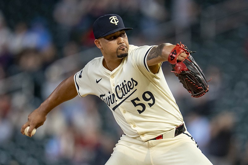 May 7, 2025; Minneapolis, Minnesota, USA; Minnesota Twins relief pitcher Jhoan Duran (59) delivers a pitch against the Baltimore Orioles in the ninth inning at Target Field. Mandatory Credit: Jesse Johnson-Imagn Images