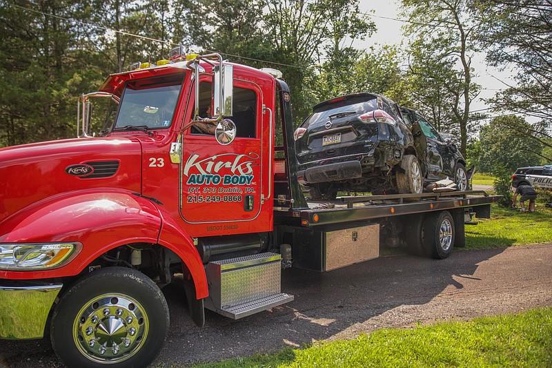 Kirks Auto Body assisted with a tow after an accident in New Britain Township Saturday afternoon. Credit: James Short