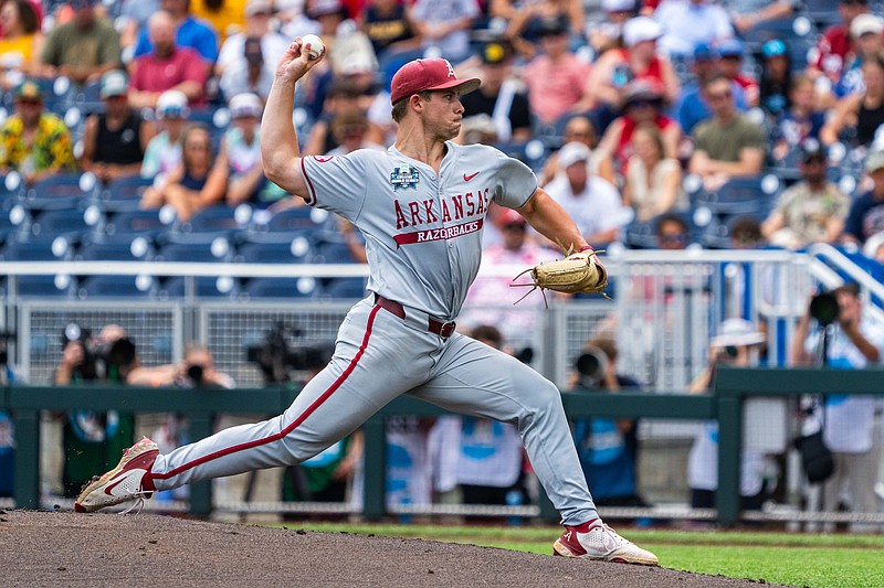 Jun 16, 2025; Omaha, Neb, USA; Arkansas Razorbacks starting pitcher Gage Wood (14) pitches against the Murray State Racers during the first inning at Charles Schwab Field. Mandatory Credit: Dylan Widger-Imagn Images
