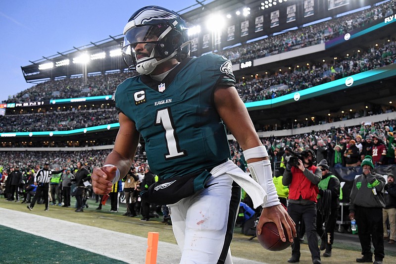 Jan 26, 2025; Philadelphia, PA, USA; Philadelphia Eagles quarterback Jalen Hurts (1) reacts after a touchdown against the Washington Commanders during the second half in the NFC Championship game at Lincoln Financial Field. Mandatory Credit: Eric Hartline-Imagn Images