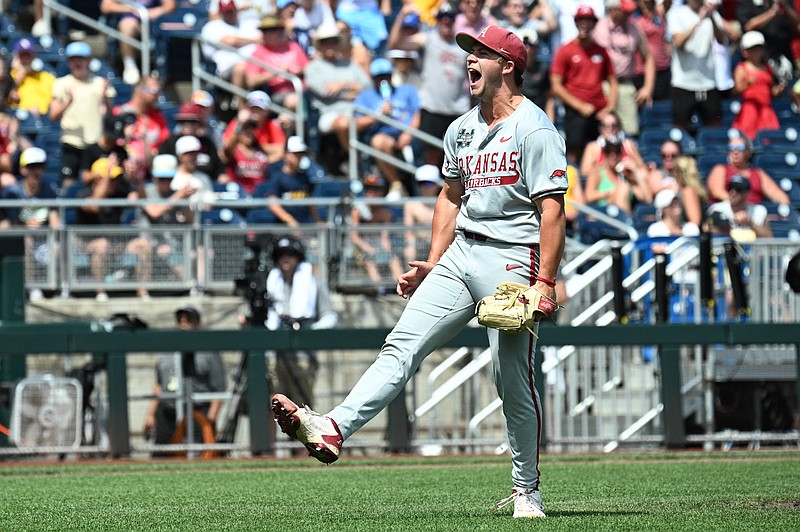 Jun 16, 2025; Omaha, Neb, USA; Arkansas Razorbacks starting pitcher Gage Wood (14) celebrates at the end of the eighth inning against the Murray State Racers at Charles Schwab Field. Mandatory Credit: Steven Branscombe-Imagn Images