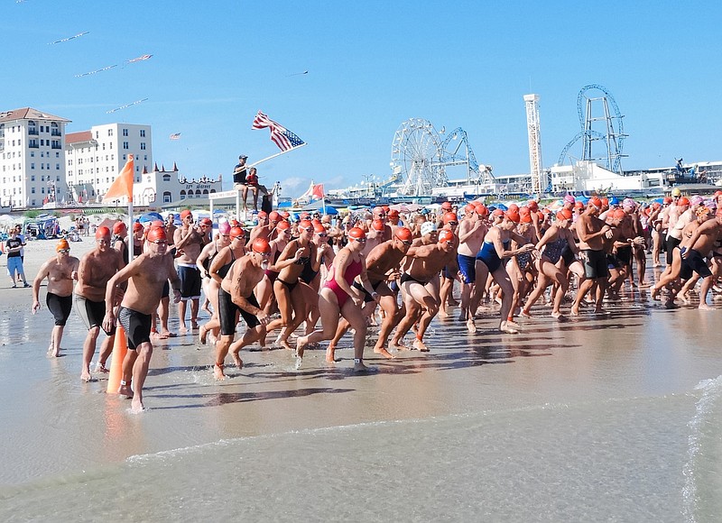 The T. John Carey Masters One-Mile Ocean Swim gets underway at 12th Street. (Photo courtesy of Ocean City)