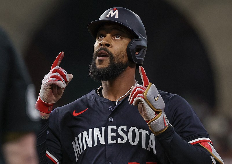 Jun 13, 2025; Houston, Texas, USA; Minnesota Twins center fielder Byron Buxton (25) reacts to his single against the Houston Astros in the first inning at Daikin Park. Mandatory Credit: Thomas Shea-Imagn Images