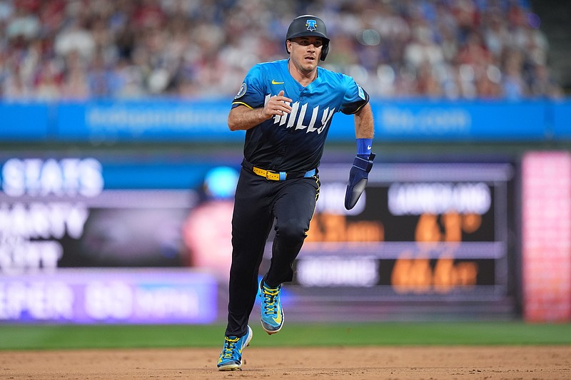 Jun 13, 2025; Philadelphia, Pennsylvania, USA; Philadelphia Phillies catcher J.T. Realmuto (10) advances to third against the Toronto Blue Jays in the sixth inning at Citizens Bank Park. Mandatory Credit: Kyle Ross-Imagn Images