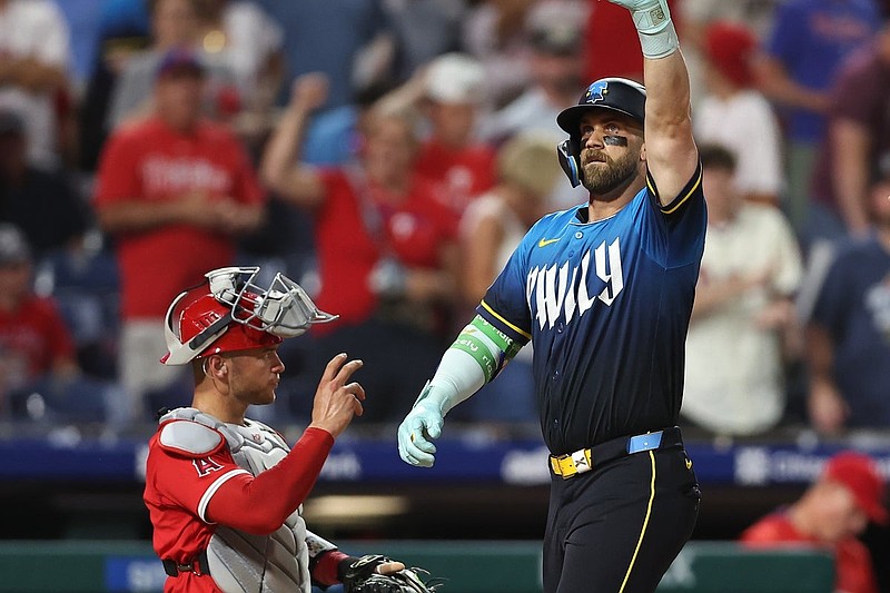 Jul 18, 2025; Philadelphia, Pennsylvania, USA; Philadelphia Phillies first base Bryce Harper (3) reacts in front of Los Angeles Angels catcher Logan O'Hoppe (14) after hitting his second home run of the game during the eighth inning at Citizens Bank Park. Mandatory Credit: Bill Streicher-Imagn Images