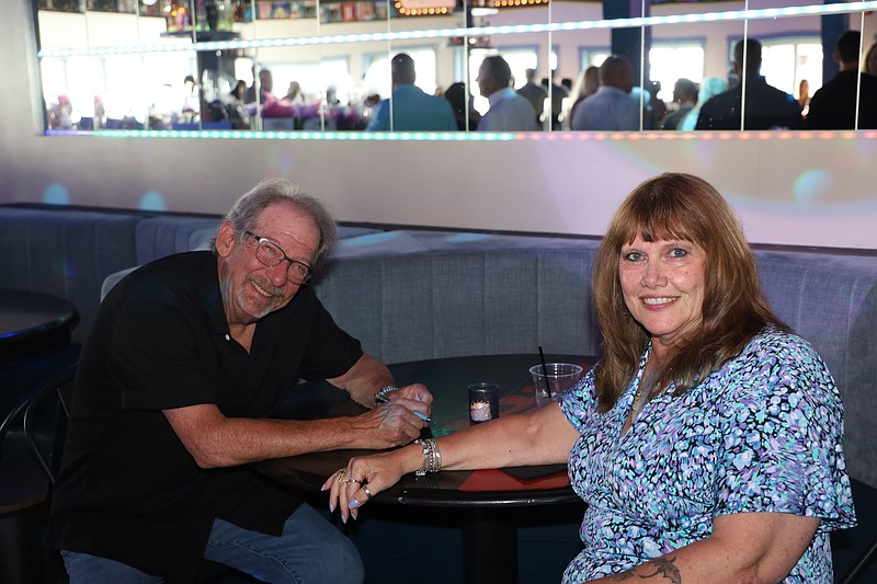 MBA President Ed Berger and Executive Director Anna Maria Blescia take a break during the MBA's annual Daniel and Maria Scholarship Wine Tasting Event, July 18, 2025.
