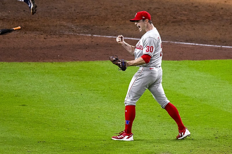Oct 28, 2022; Houston, Texas, USA; Philadelphia Phillies relief pitcher David Robertson (30) celebrates the Phillies getting the last out for the victory over the Houston Astros during the tenth inning during game one of the 2022 World Series at Minute Maid Park. Mandatory Credit: Jerome Miron-USA TODAY Sports