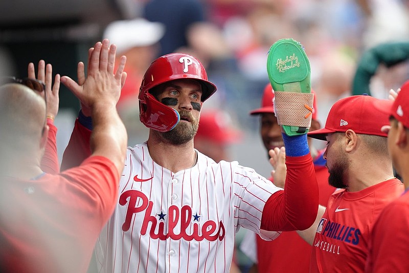 Jul 22, 2025; Philadelphia, Pennsylvania, USA; Philadelphia Phillies infielder Bryce Harper (3) celebrates with teammates after scoring a run against the Boston Red Sox in the first inning at Citizens Bank Park. Mandatory Credit: Kyle Ross-Imagn Images