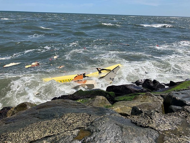 This photo courtesy of the Avalon Beach Patrol shows the wreckage of the sunken sailboat.