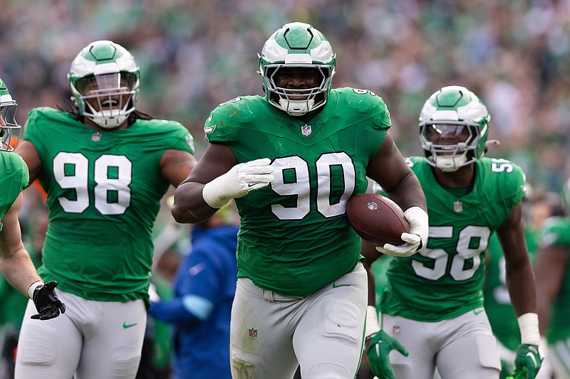 Dec 29, 2024; Philadelphia, Pennsylvania, USA; Philadelphia Eagles defensive tackle Jordan Davis (90) celebrate with teammates after his fumble recovery against the Dallas Cowboys during the second quarter at Lincoln Financial Field. Mandatory Credit: Bill Streicher-Imagn Images