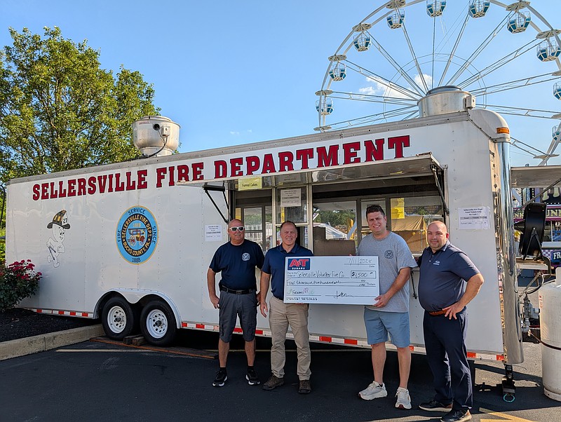 From left, Douglas C. Wilhelm, Sellersville Fire Department chief; Joe Fost, A&T Chevrolet-Subaru general manager; Greg Swierzewski, Sellersville Fire Department president; and Phil LaFiura, A&T Subaru general manager (Credit: A&T Subaru)