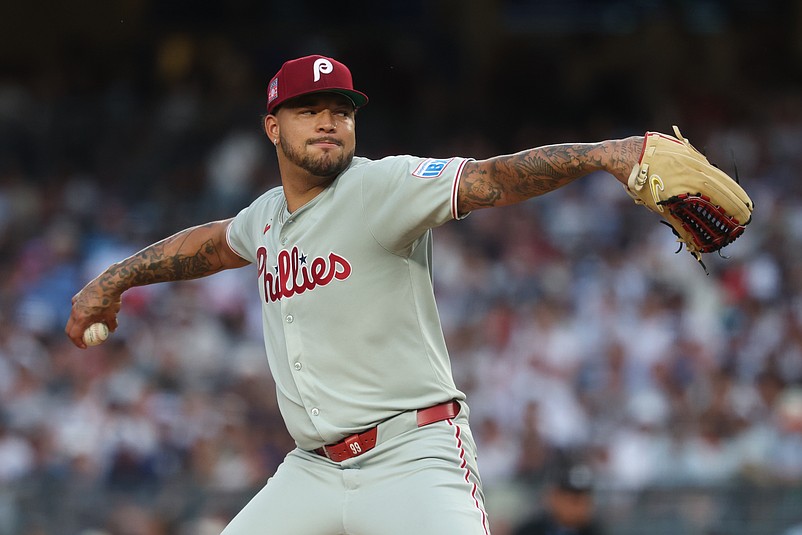 Jul 25, 2025; Bronx, New York, USA; Philadelphia Phillies relief pitcher Taijuan Walker (99) delivers a pitch during the second inning against the New York Yankees at Yankee Stadium. Mandatory Credit: Vincent Carchietta-Imagn Images