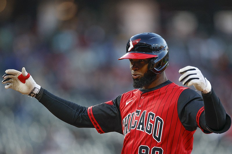 May 23, 2025; Chicago, Illinois, USA; Chicago White Sox center fielder Luis Robert Jr. (88) celebrates after hitting an RBI-single against the Texas Rangers during the third inning at Rate Field. Mandatory Credit: Kamil Krzaczynski-Imagn Images