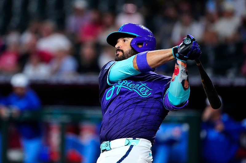 Diamondbacks infielder Eugenio Suarez (28) hits an RBI single against the Royals in the third inning during a game in Phoenix, at Chase Field on July 5, 2025.