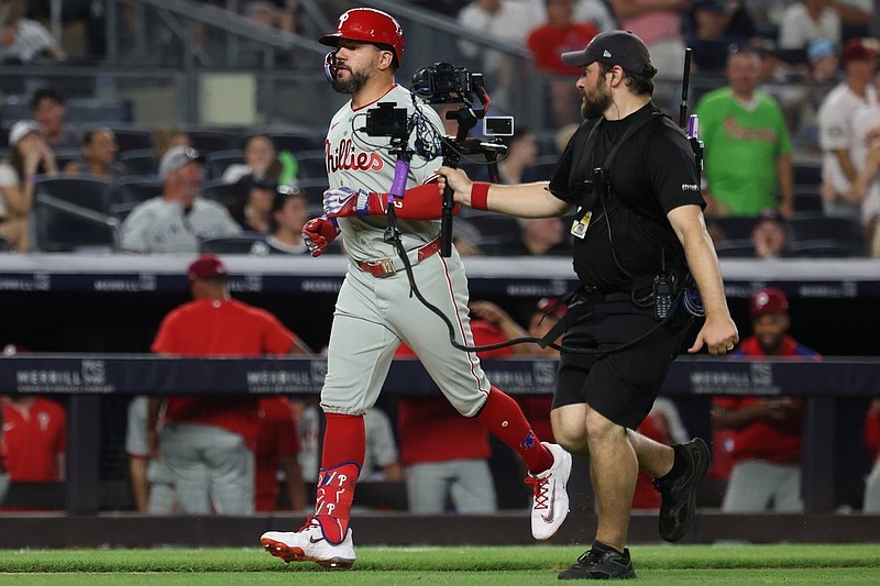 Jul 25, 2025; Bronx, New York, USA; Philadelphia Phillies designated hitter Kyle Schwarber (12) runs the bases after hitting a two run home run during the eighth inning against the New York Yankees at Yankee Stadium. Mandatory Credit: Vincent Carchietta-Imagn Images