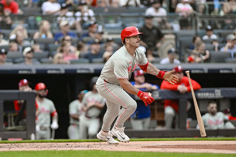 Jul 27, 2025; Bronx, New York, USA; Philadelphia Phillies first baseman Otto Kemp (4) hits a solo home run against the New York Yankees during the second inning at Yankee Stadium. Mandatory Credit: John Jones-Imagn Images