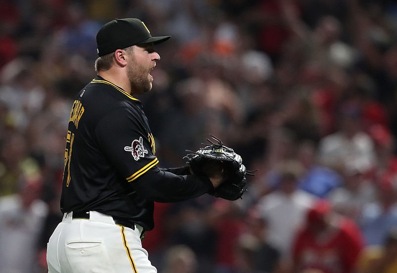 Jul 1, 2025; Pittsburgh, Pennsylvania, USA;  Pittsburgh Pirates relief pitcher David Bednar (51) reacts after the final out against the St. Louis Cardinals at PNC Park. Mandatory Credit: Charles LeClaire-Imagn Images
