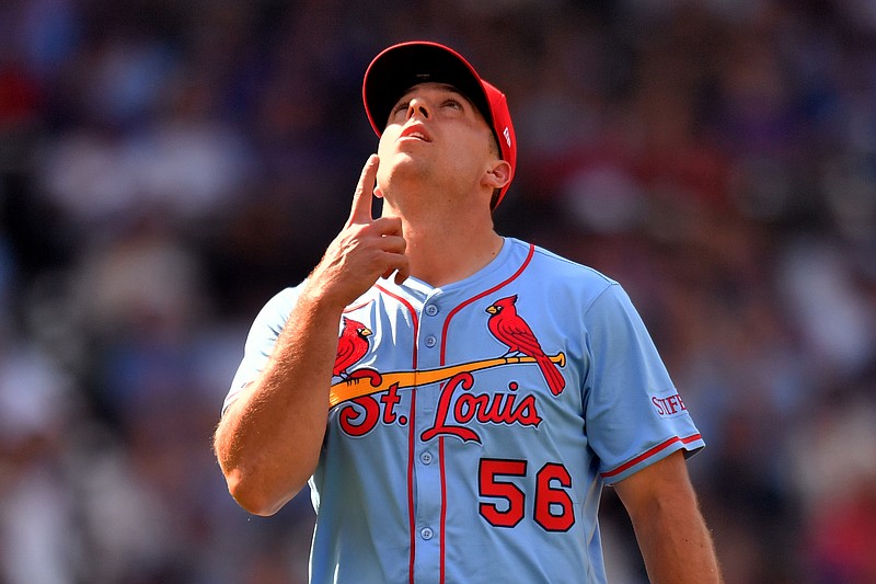 Jul 5, 2025; Chicago, Illinois, USA; St. Louis Cardinals pitcher Ryan Helsley (56) celebrates after defeating the Chicago Cubs at Wrigley Field. Mandatory Credit: Patrick Gorski-Imagn Images