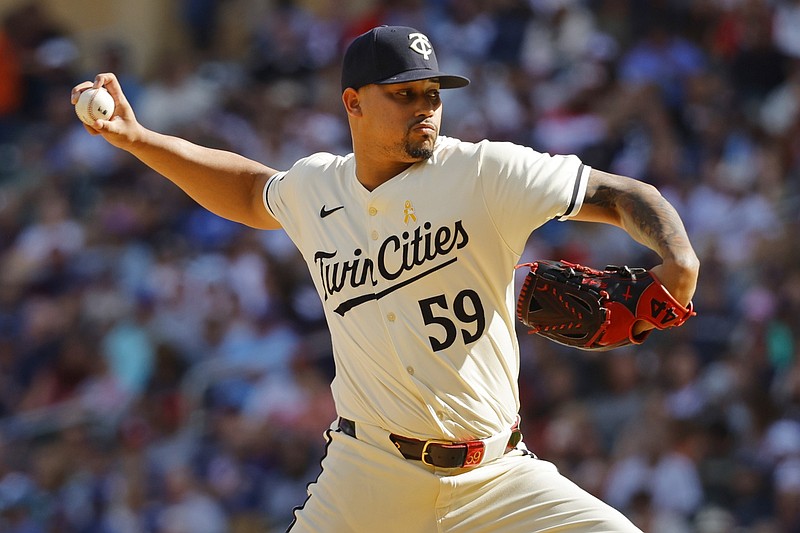 Sep 1, 2024; Minneapolis, Minnesota, USA; Minnesota Twins relief pitcher Jhoan Duran (59) throws to the Toronto Blue Jays in the ninth inning at Target Field. Mandatory Credit: Bruce Kluckhohn-USA TODAY Sports