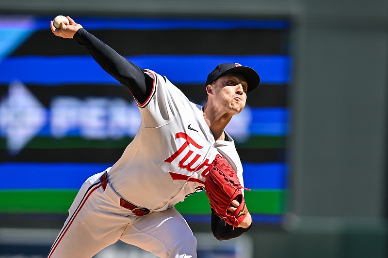 Apr 26, 2025; Minneapolis, Minnesota, USA; Minnesota Twins pitcher Griffin Jax (22) throws a pitch against the Los Angeles Angels during the seventh inning at Target Field. Mandatory Credit: Jeffrey Becker-Imagn Images