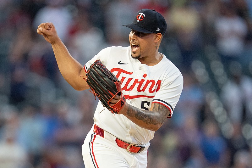 May 10, 2025; Minneapolis, Minnesota, USA; Minnesota Twins pitcher Jhoan Duran (59) celebrates after striking out San Francisco Giants shortstop Willy Adames (2) to end the game in the top of the ninth inning at Target Field. Mandatory Credit: Matt Blewett-Imagn Images