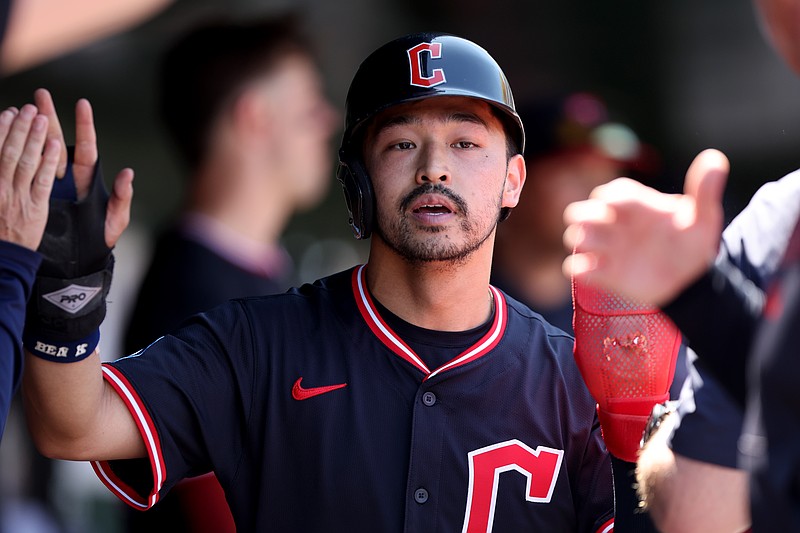 Jun 22, 2025; West Sacramento, California, USA; Cleveland Guardians left fielder Steven Kwan (38) celebrates with teammates after scoring a run against the Athletics during the fifth inning at Sutter Health Park. Mandatory Credit: Dennis Lee-Imagn Images