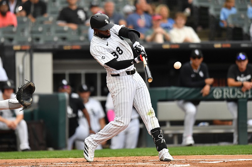 Jul 30, 2025; Chicago, Illinois, USA; Chicago White Sox center fielder Luis Robert Jr. (88) hits a single during the second inning against the Philadelphia Phillies at Rate Field. Mandatory Credit: Patrick Gorski-Imagn Images