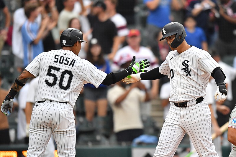 Jul 30, 2025; Chicago, Illinois, USA; Chicago White Sox third baseman Miguel Vargas (20) celebrates with second baseman Lenyn Sosa (50) after hitting a three-run home run during the seventh inning against the Philadelphia Phillies at Rate Field. Mandatory Credit: Patrick Gorski-Imagn Images