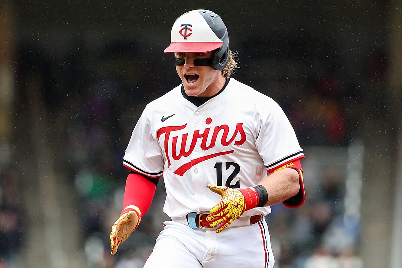 May 21, 2025; Minneapolis, Minnesota, USA; Minnesota Twins center fielder Harrison Bader (12) celebrates his RBI single against the Cleveland Guardians in the eighth inning during game one of a doubleheader at Target Field. Mandatory Credit: Matt Krohn-Imagn Images