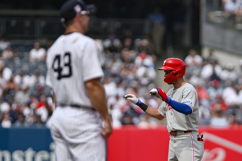 Jul 26, 2025; Bronx, New York, USA; Philadelphia Phillies shortstop Trea Turner (7) reacts after hitting a RBI double against the New York Yankees during the sixth inning at Yankee Stadium. Mandatory Credit: John Jones-Imagn Images