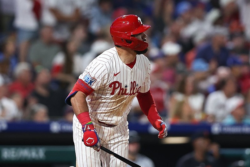 Aug 3, 2025; Philadelphia, Pennsylvania, USA; Philadelphia Phillies outfielder Kyle Schwarber (12) hits a home run during the eighth inning against the Detroit Tigers at Citizens Bank Park. Mandatory Credit: Bill Streicher-Imagn Images
