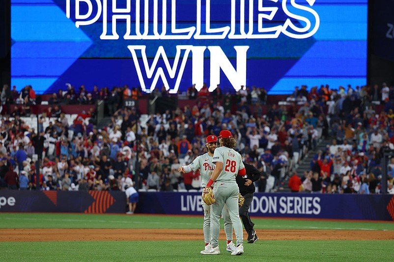 [US, Mexico &amp; Canada customers only] June 8, 2024; London, UNITED KINGDOM;  Philadelphia Phillies players Bryce Harper and Alec Bohm celebrate after defeating the New York Mets during a London Series baseball game at Queen Elizabeth Olympic Park. Mandatory Credit: Matthew Childs/Reuters via Imagn Images