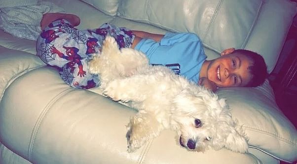 Ameechi with Amanda Frazier's son. (Change.org petition)