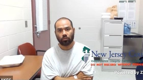Johnny Flores appears at his detention hearing via video from the Ann Klein Forensic Center in Trenton, where he is currently committed.