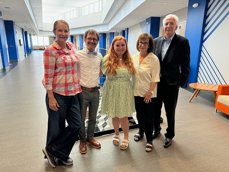 Stockton University student Hailey Bidinger, center, is the recipient of this year's Paul D. Staller '97 Writing Center Tutor Award. Joining her, from left, are Staller's sister, Laurie Staller; Stockton Writing Center Coordinator Eddie Horan, and Staller's parents, Billie and Alan Staller.